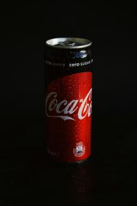 Coca Cola Can on Black Surface